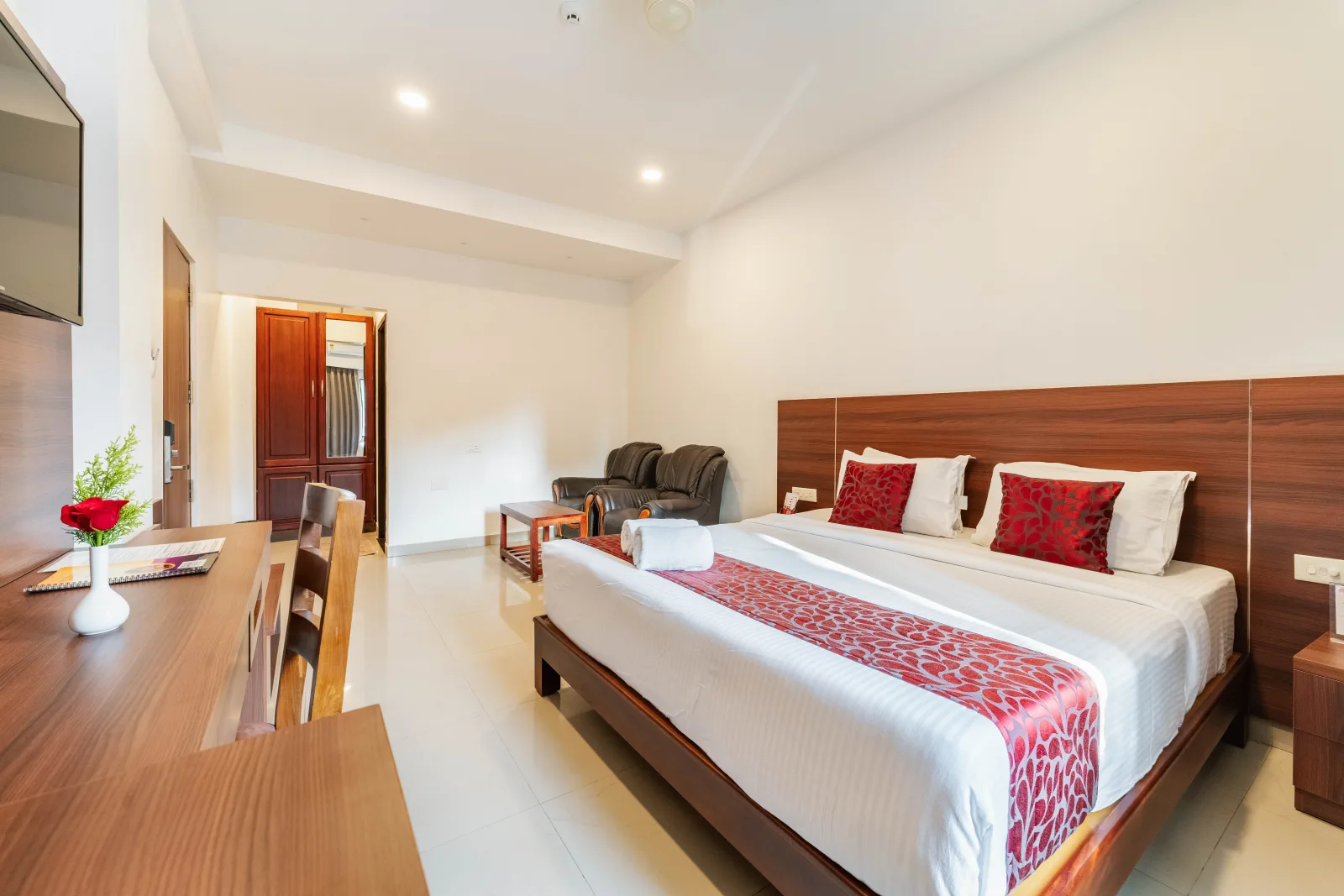 Deluxe Double Room — bedding and seating